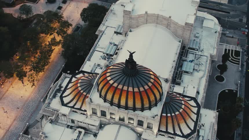 An aerial view of a large building in a city