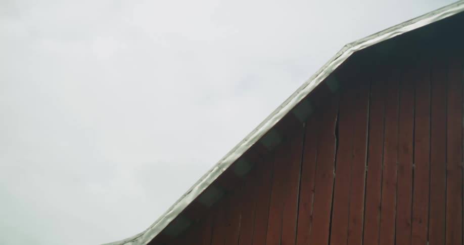 View of building roof against the cloudy sky