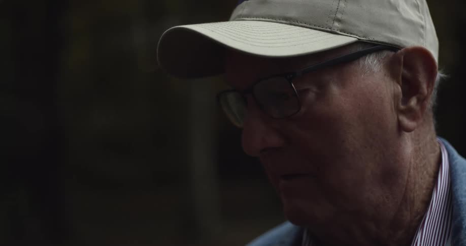 Elderly man not looking at the camera