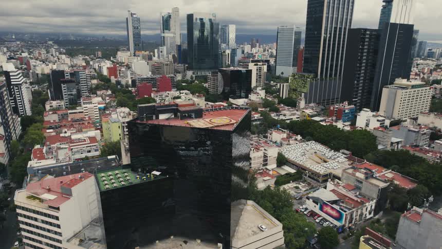 An aerial view of office buildings in a downtown area