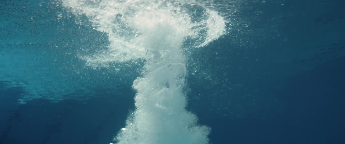 Person diving into water