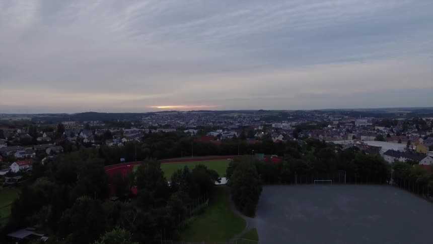 A city near sunrise