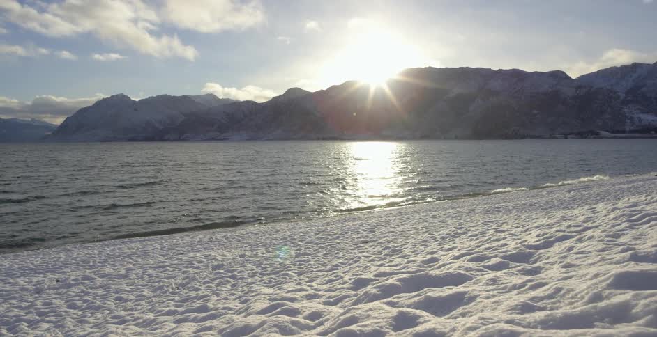 View of a snowy beach on a sunny day