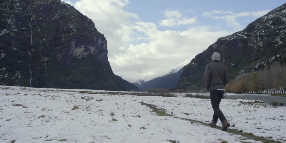A person walking in the snow