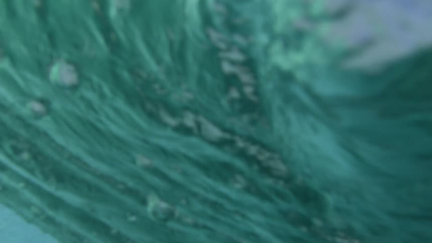 Lip of Wave crashes across lens