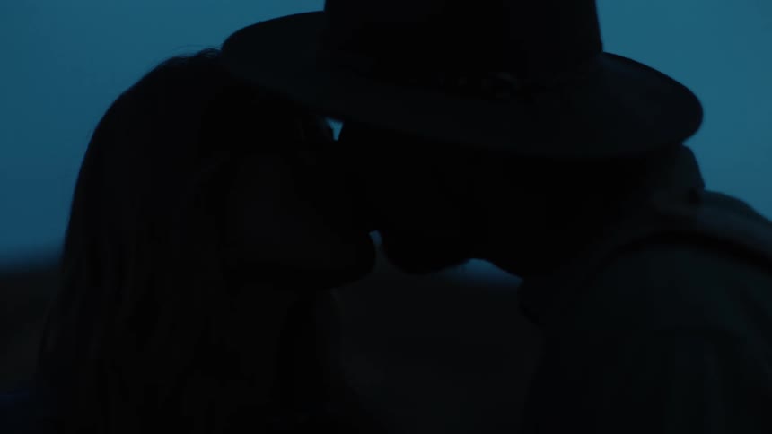 A boyfriend and girlfriend kissing each other