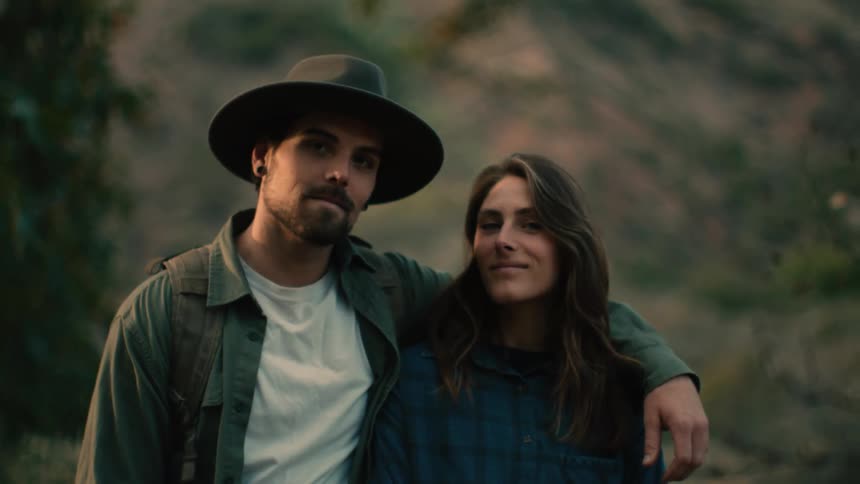 A portrait of two people outdoors