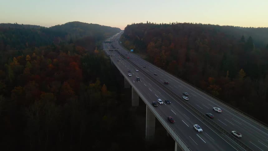 The traffic is moving steady on the highway