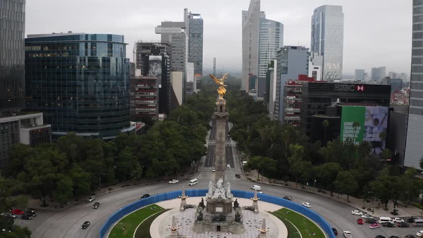 An aerial view of a roundabout in a city