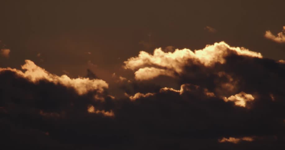 The clouds are dark in the sky