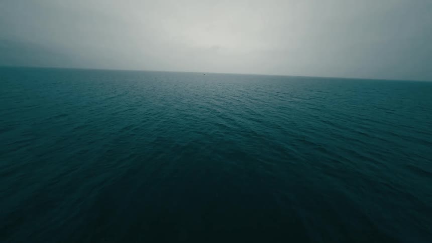 The rippled surface of the ocean on a cloudy day