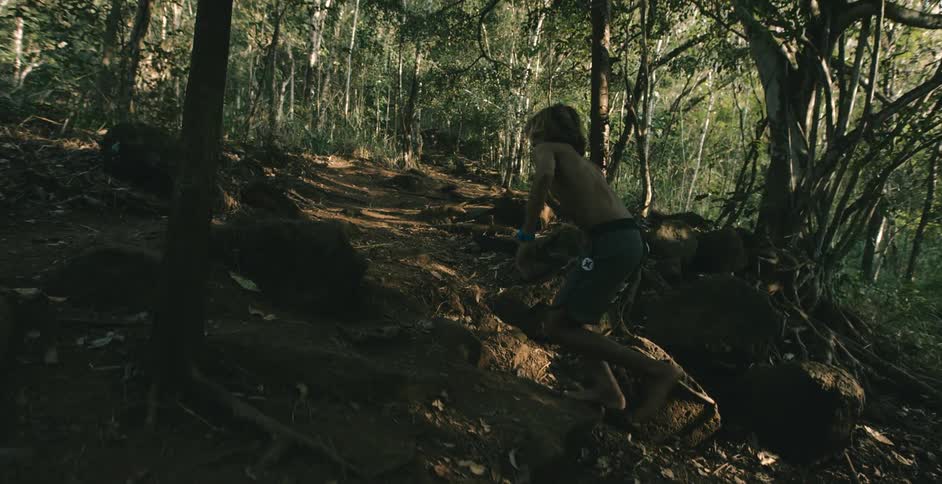A person running through a forest