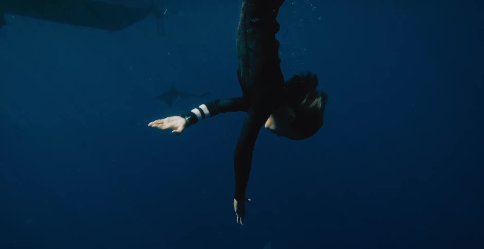 A person diving into the ocean