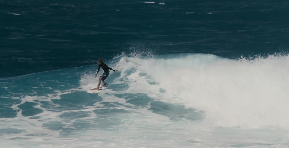 Person surfing in the ocean