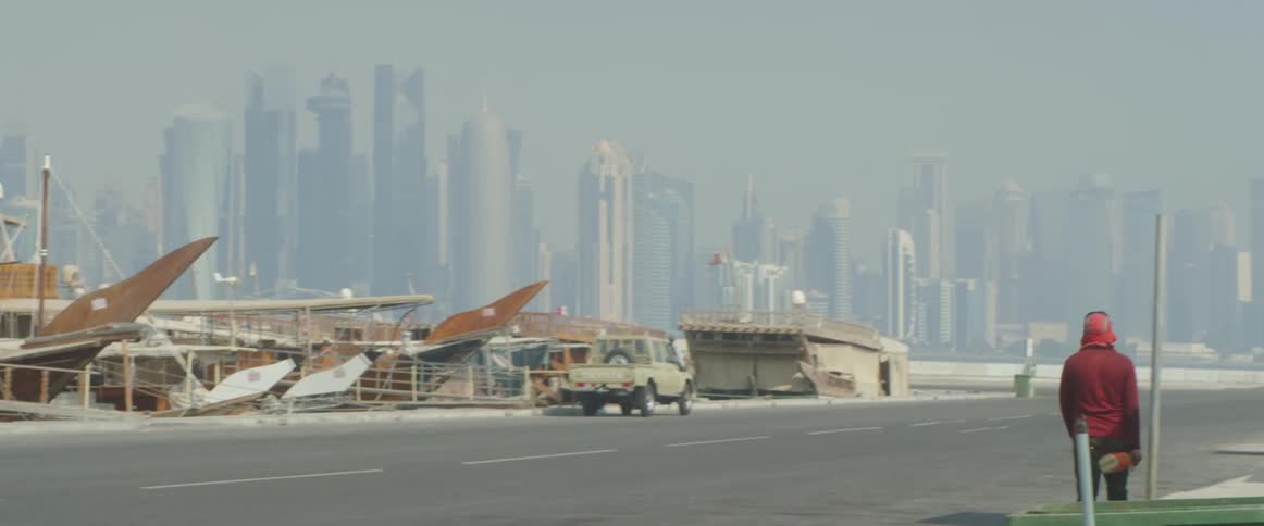 Pedestrians are walking in a city during the daytime