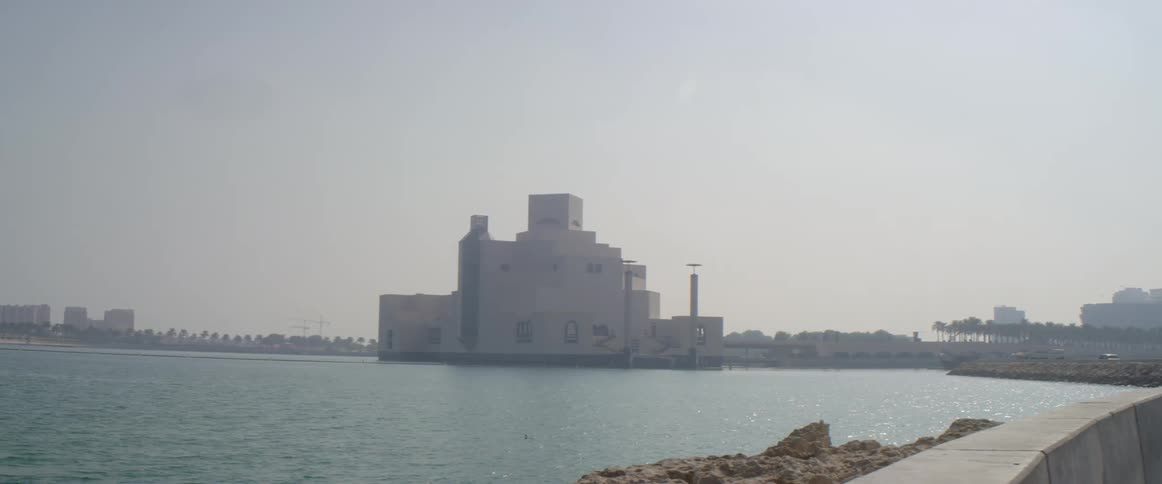 A view of a building on the water