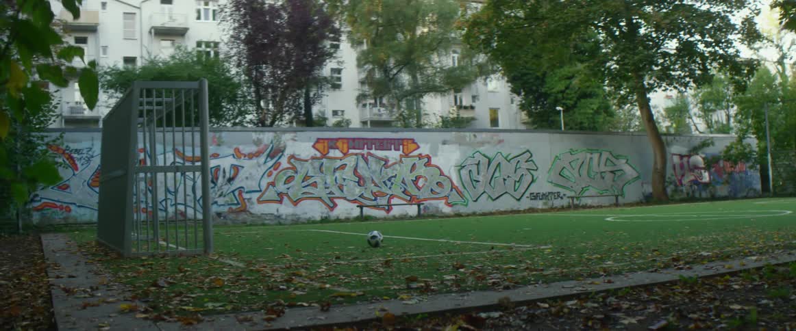 An empty soccer field is shown in spring