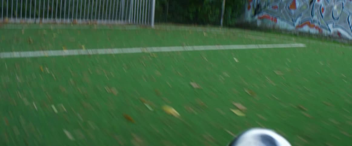 Soccer ball being kicked on a soccer field until it reachs the goal