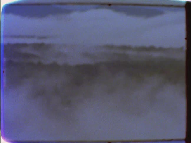 A field is covered with heavy fog