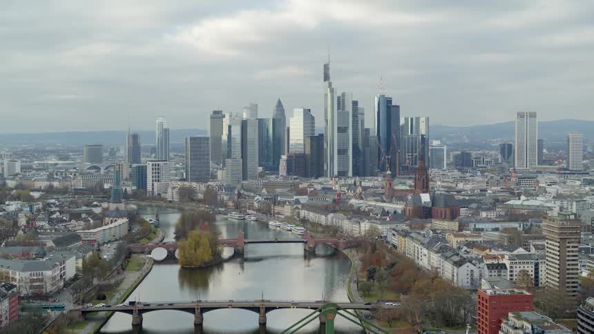 Aerial view of a downtown skyline is displayed