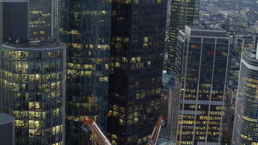 An aerial view of tall office buildings in a large city