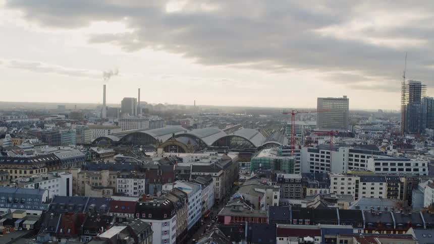 Aerial view of a downtown city is displayed on a cloudy day