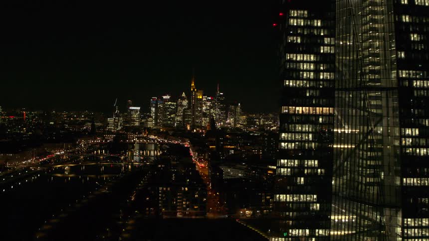 Aerial view of downtown buildings are displayed at night