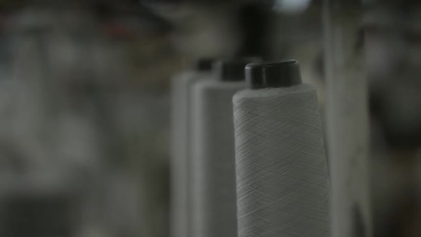 Spools of thread on a machine
