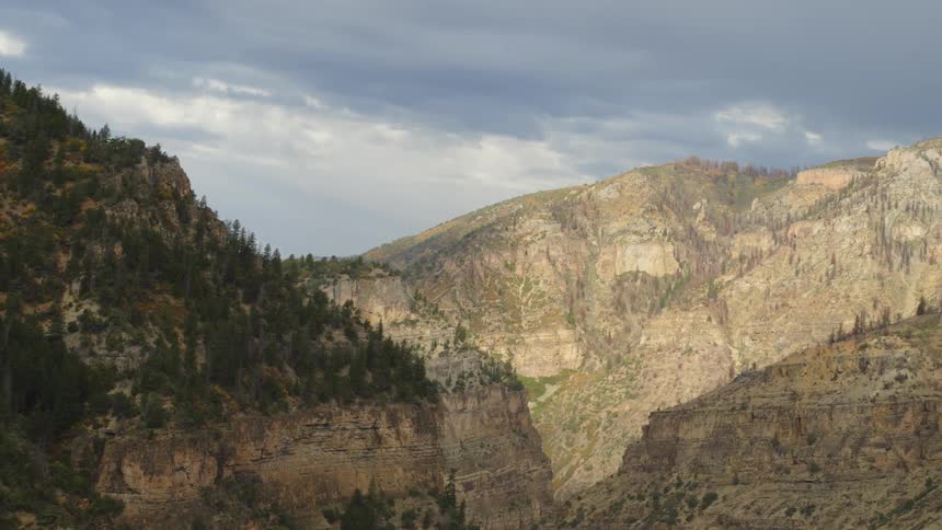 Aerial view of a canyon in the mountains on an overcast day