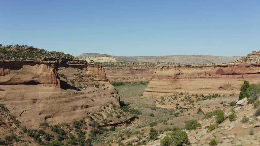 Aerial view of valley and canyons is displayed in spring