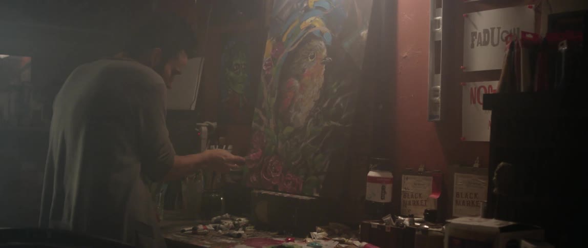 A person is painting a portrait