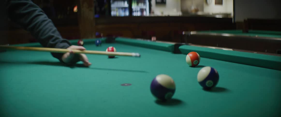 A man its the cue ball in the pool hall