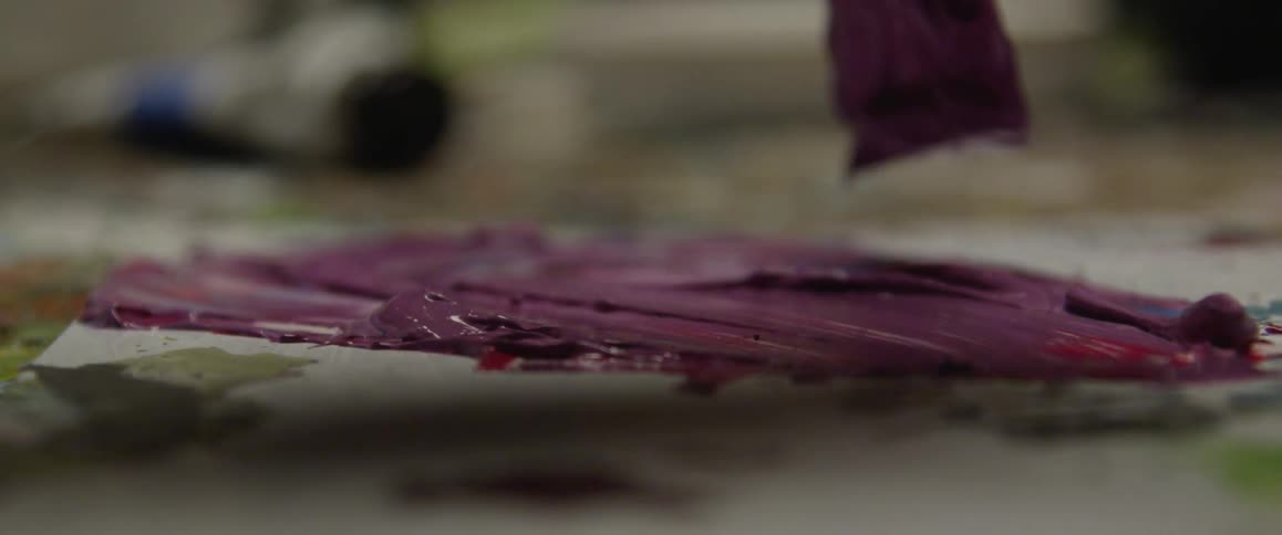 Purple paint is being mixed
