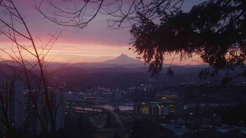 Time lapse view of an urban city at dusk