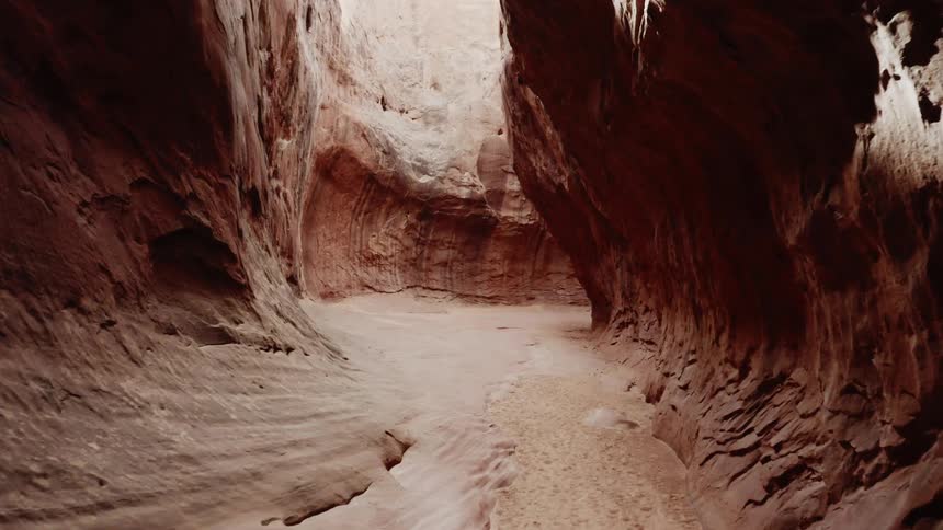 The stone formation has created a path in the canyon