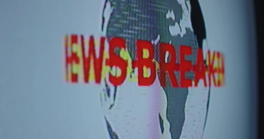 Television screen with breaking news