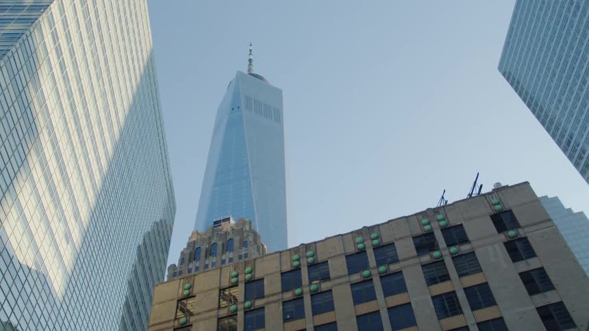 High rise office buildings and skyscraper with spire againstthe blue sky