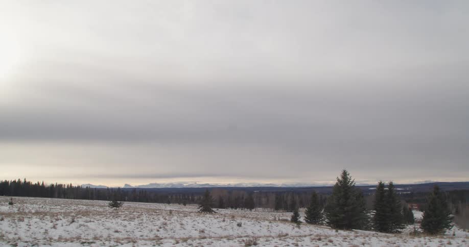 Snow is covering the plains at dusk