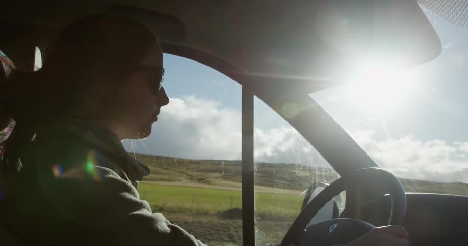 Woman driving a vehicle