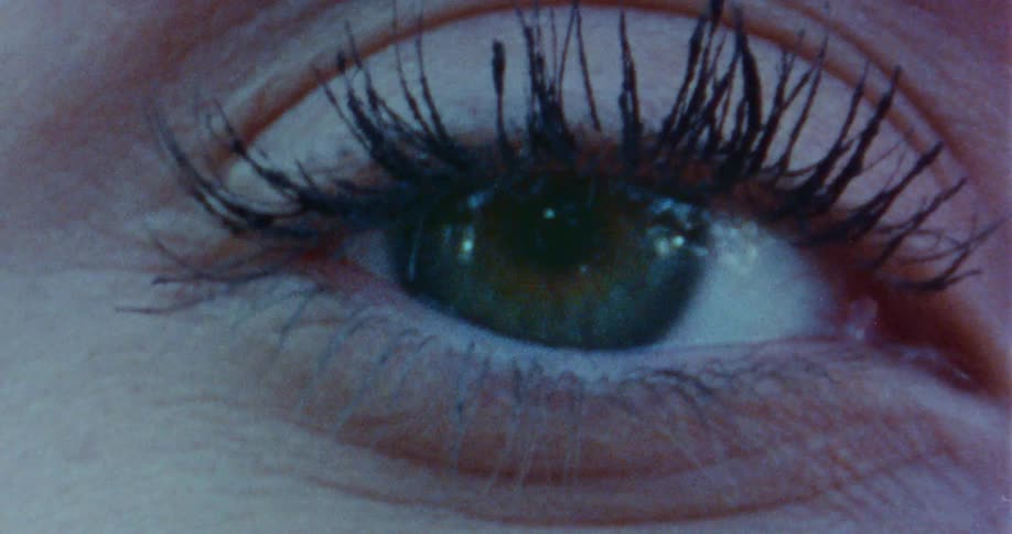 The eye has long black lashes
