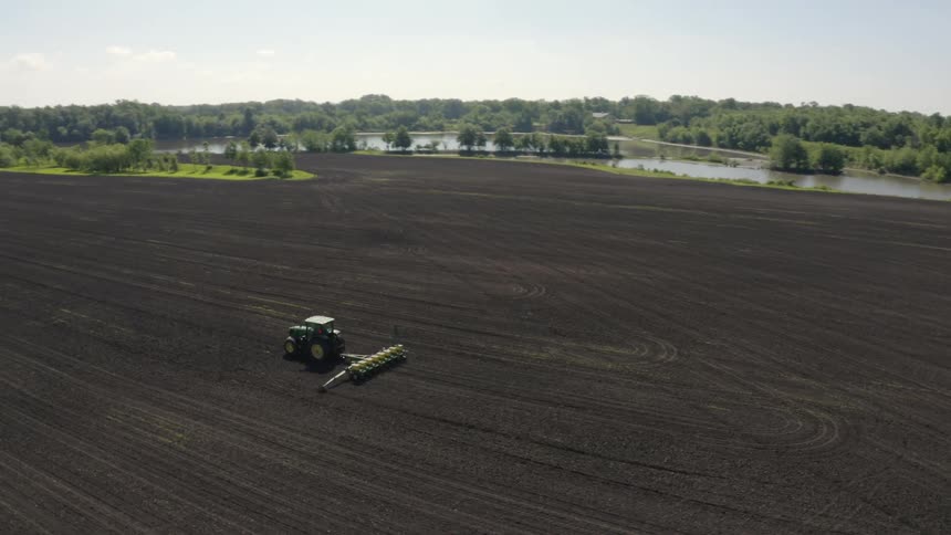 Tractor tilling field