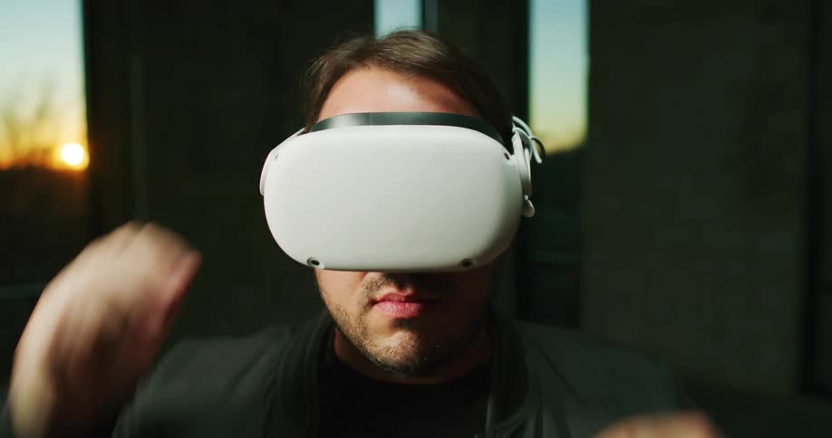 A man puts on a virtual reality headset