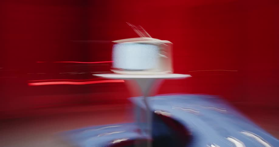 A tube style television spins around on a table