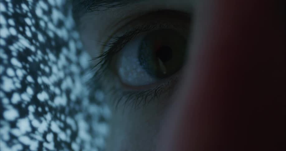 Close up view of a persons face is displayed by static