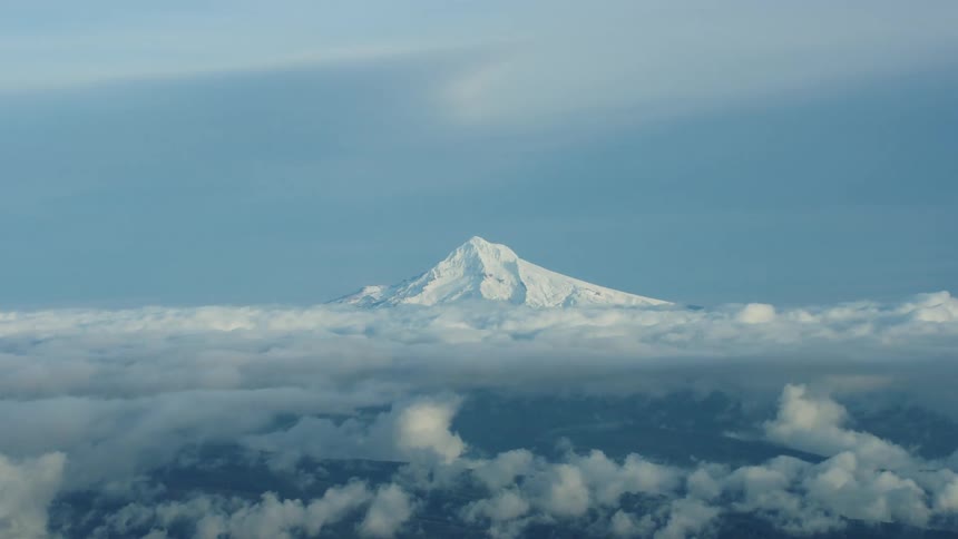 High Altitude time lapse of clouds passing in front of Mount Hood