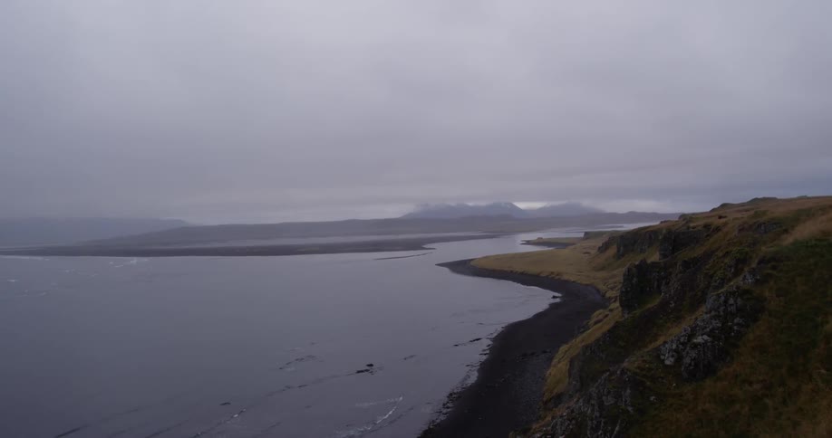 Aerial view of a coastline on a very cloudy day