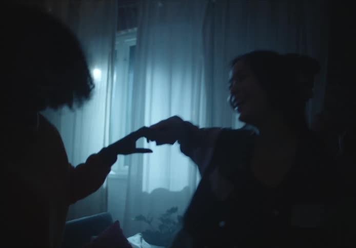 A group of people dancing at a party