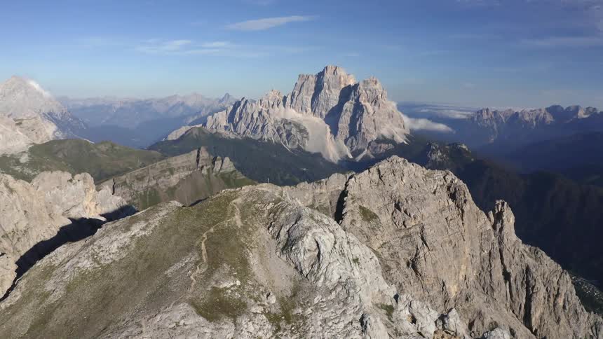 Mountain range with peaks high in the sky