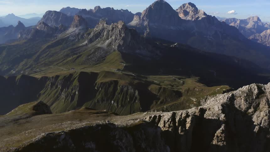 The tall mountains are covered with light fog