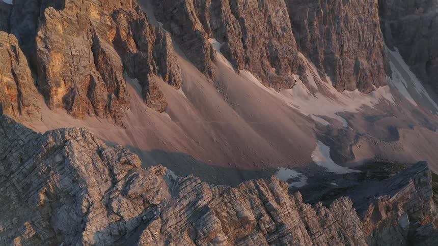An aerial view of valley in a mountain range